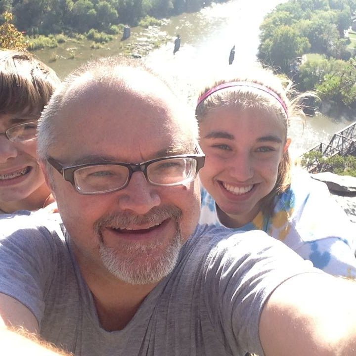 father and kids taking selfie at harpers ferry WV