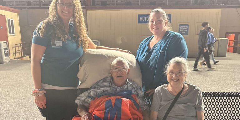 Patient and Transport Team posing for a photo.
